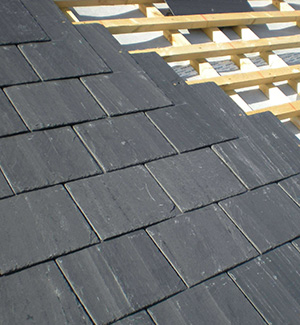 Part way through a slate roof in Oldham
